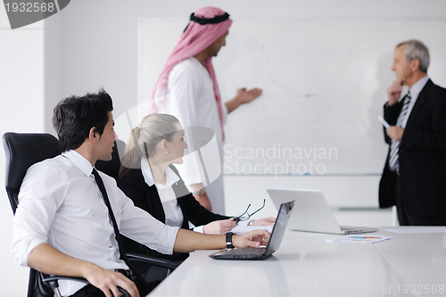 Image of Arabic business man at meeting