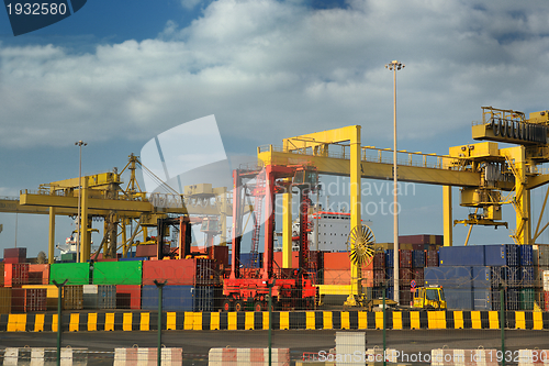 Image of container ship leaving the container port terminal