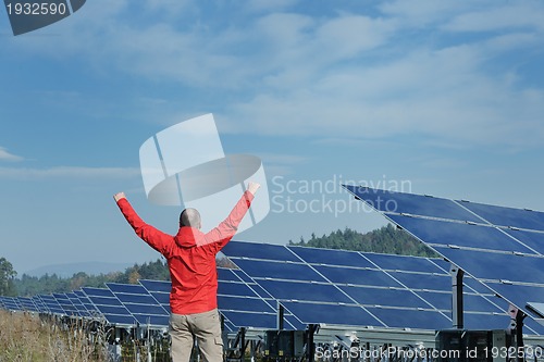 Image of Male solar panel engineer at work place