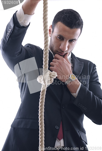 Image of business man with rope isolated on white background