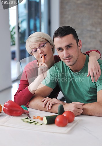 Image of young couple have fun in modern kitchen