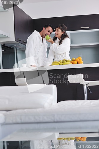 Image of young couple have fun in modern kitchen