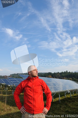 Image of Male solar panel engineer at work place