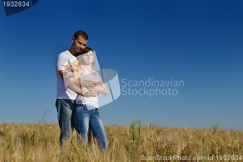 Image of happy couple in wheat field