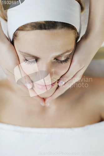 Image of Beautiful young woman in spa