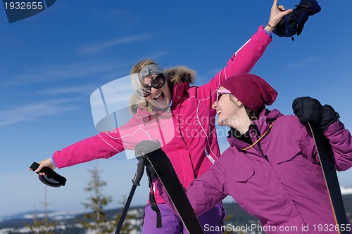 Image of winter season fun with group of girls
