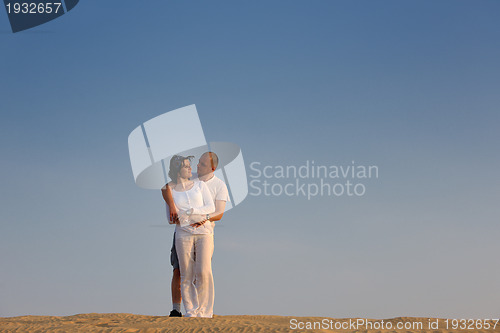 Image of couple enjoying the sunset