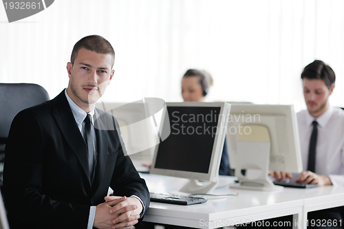 Image of business people group working in customer and help desk office