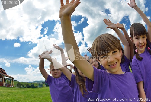 Image of happy kids group  have fun in nature
