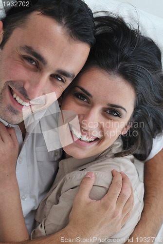 Image of happy young couple relax at home