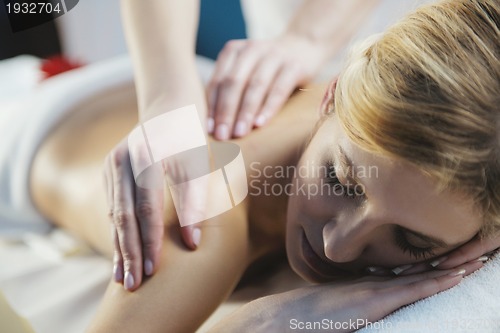 Image of Beautiful young woman in spa