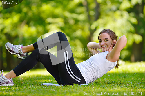 Image of woman stretching before fitness