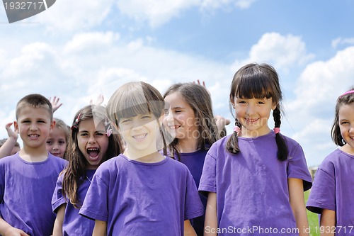 Image of happy kids group  have fun in nature