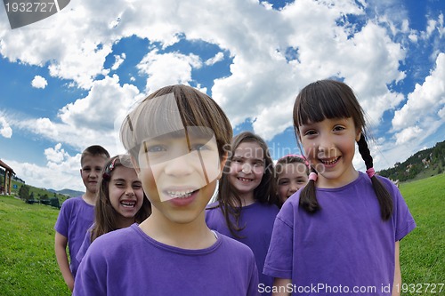 Image of happy kids group  have fun in nature