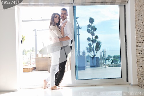 Image of happy young couple relax at home