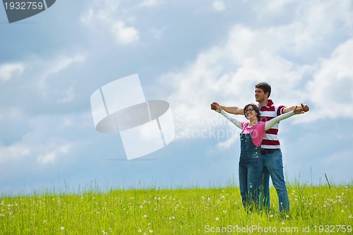 Image of romantic young couple in love together outdoor