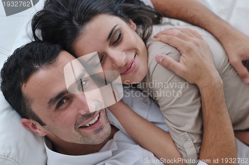 Image of happy young couple relax at home