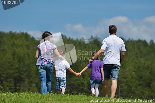 Image of happy young family have fun outdoors