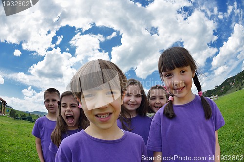 Image of happy kids group  have fun in nature