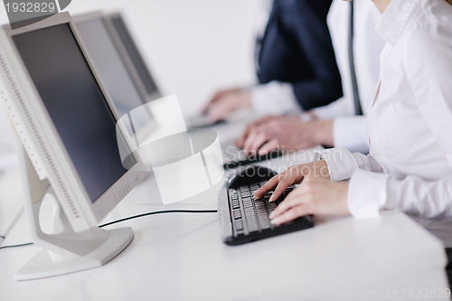 Image of business people group working in customer and helpdesk office