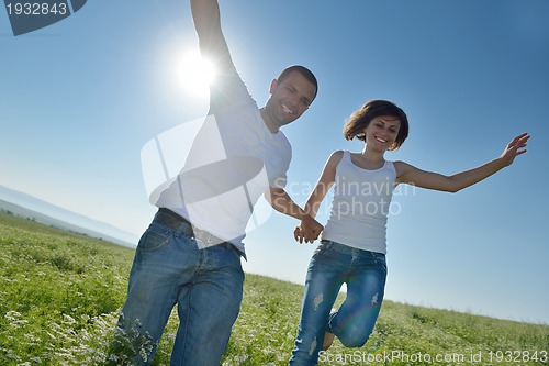 Image of happy couple in wheat field