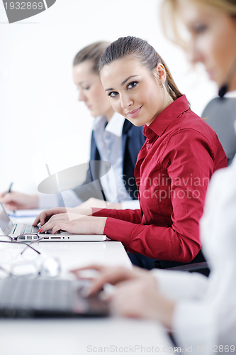 Image of business woman group with headphones