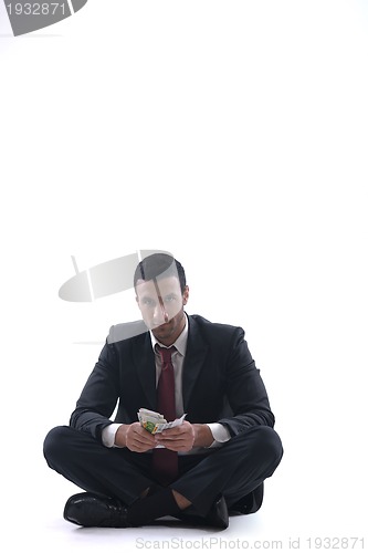 Image of Business man holding money