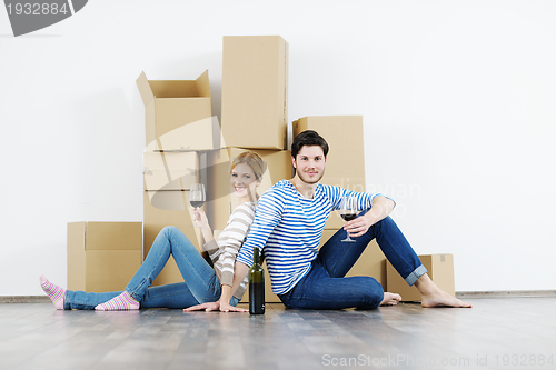 Image of Young couple moving in new house