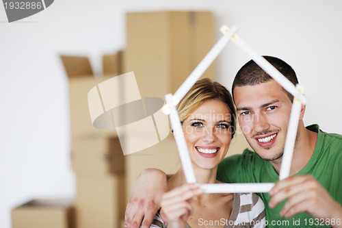 Image of Young couple moving in new house