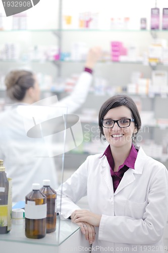 Image of team of pharmacist chemist woman  in pharmacy drugstore