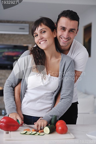 Image of young couple have fun in modern kitchen