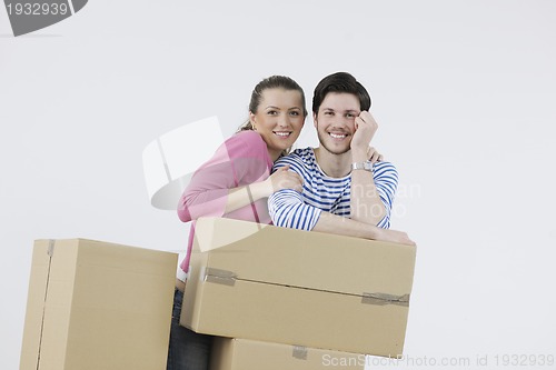 Image of Young couple moving in new home