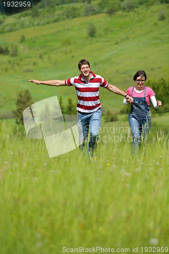 Image of romantic young couple in love together outdoor