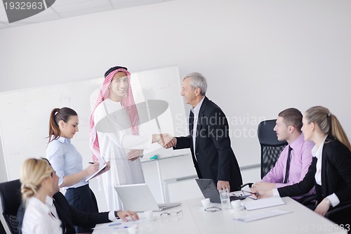 Image of Arabic business man at meeting