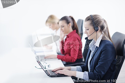 Image of business woman group with headphones