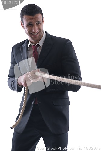 Image of business man with rope isolated on white background