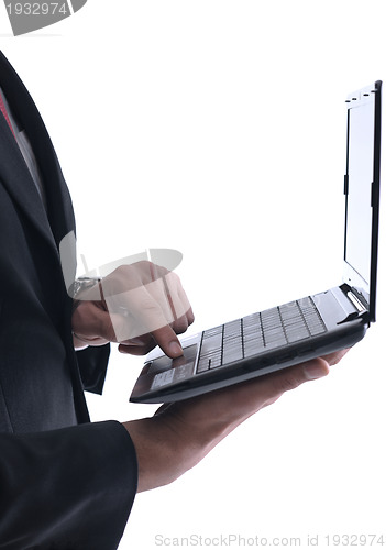 Image of business man work on mini laptop