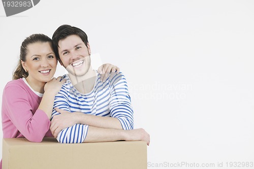 Image of Young couple moving in new home