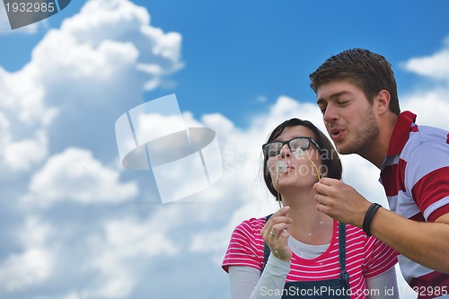 Image of romantic young couple in love together outdoor