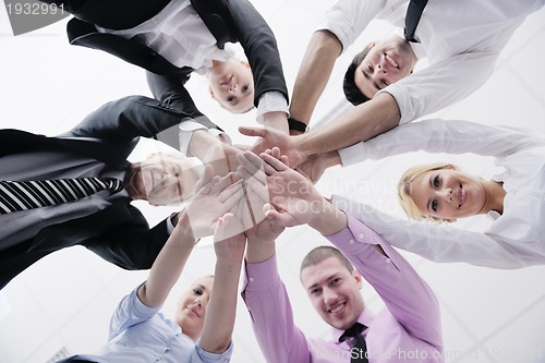 Image of business people group joining hands