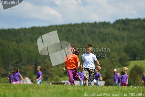 Image of happy kids group  have fun in nature
