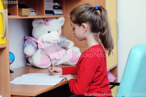 Image of girl doing homework
