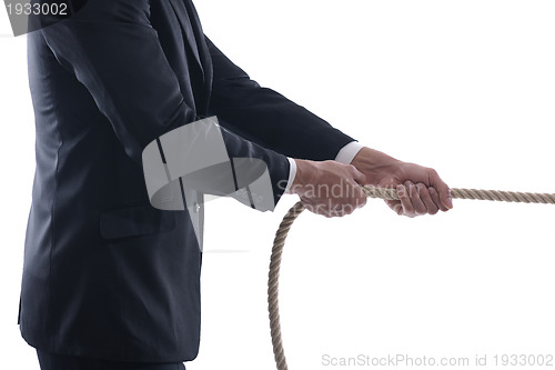 Image of business man with rope isolated on white background