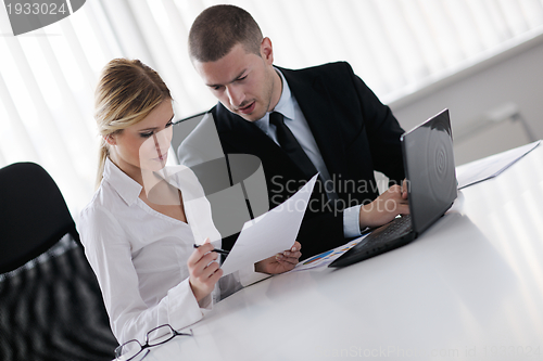 Image of business people in a meeting at office