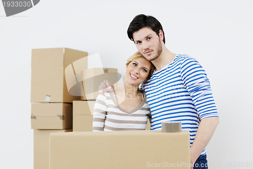 Image of Young couple moving in new house