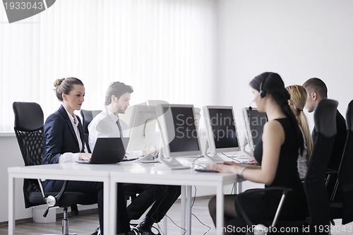 Image of business people group working in customer and help desk office