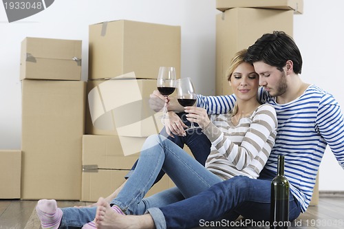 Image of Young couple moving in new home