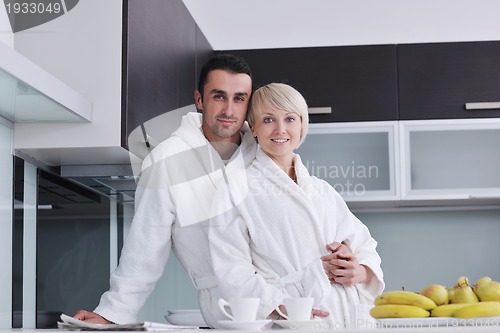 Image of young couple have fun in modern kitchen