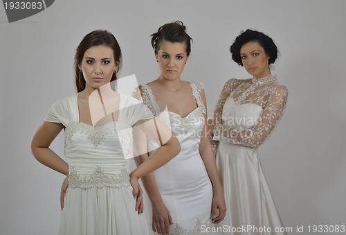 Image of portrait of a three beautiful woman in wedding dress