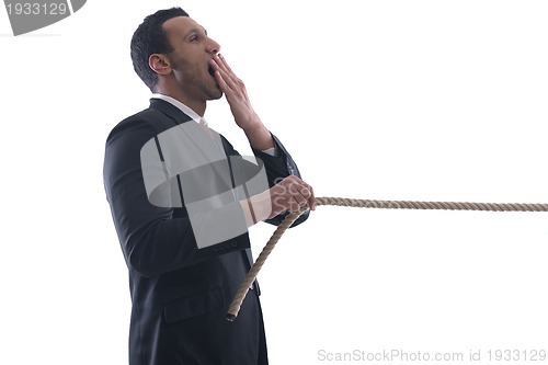 Image of business man with rope isolated on white background